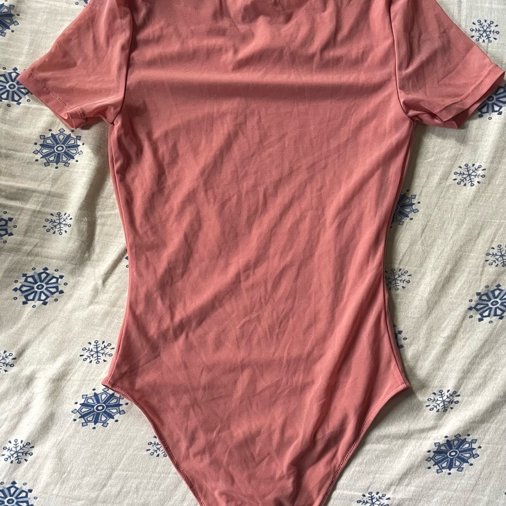 Pink Bodysuit with Short Sleeves and Snap Closure